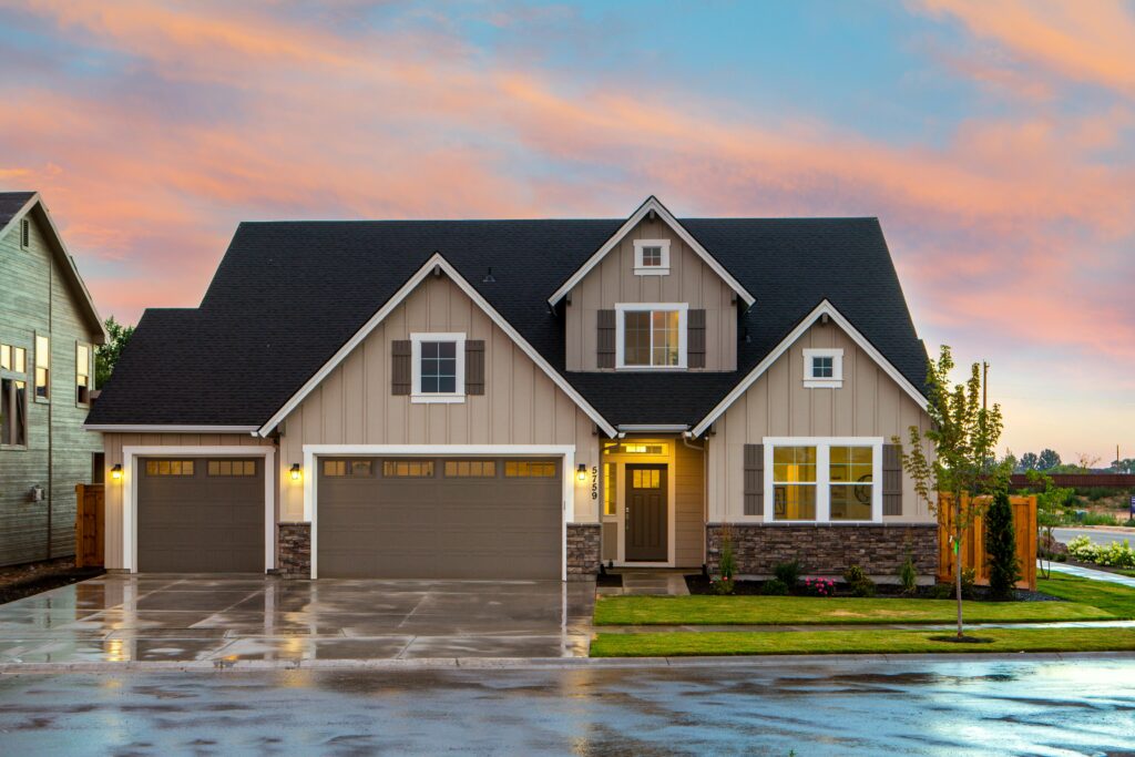 Charming family home in Madison, Wi with a modern facade and spacious garage.
